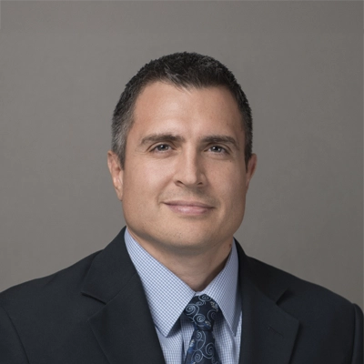 A headshot of Dr. John-Paul Curletto, a chiropractor at Chiropractic Works.